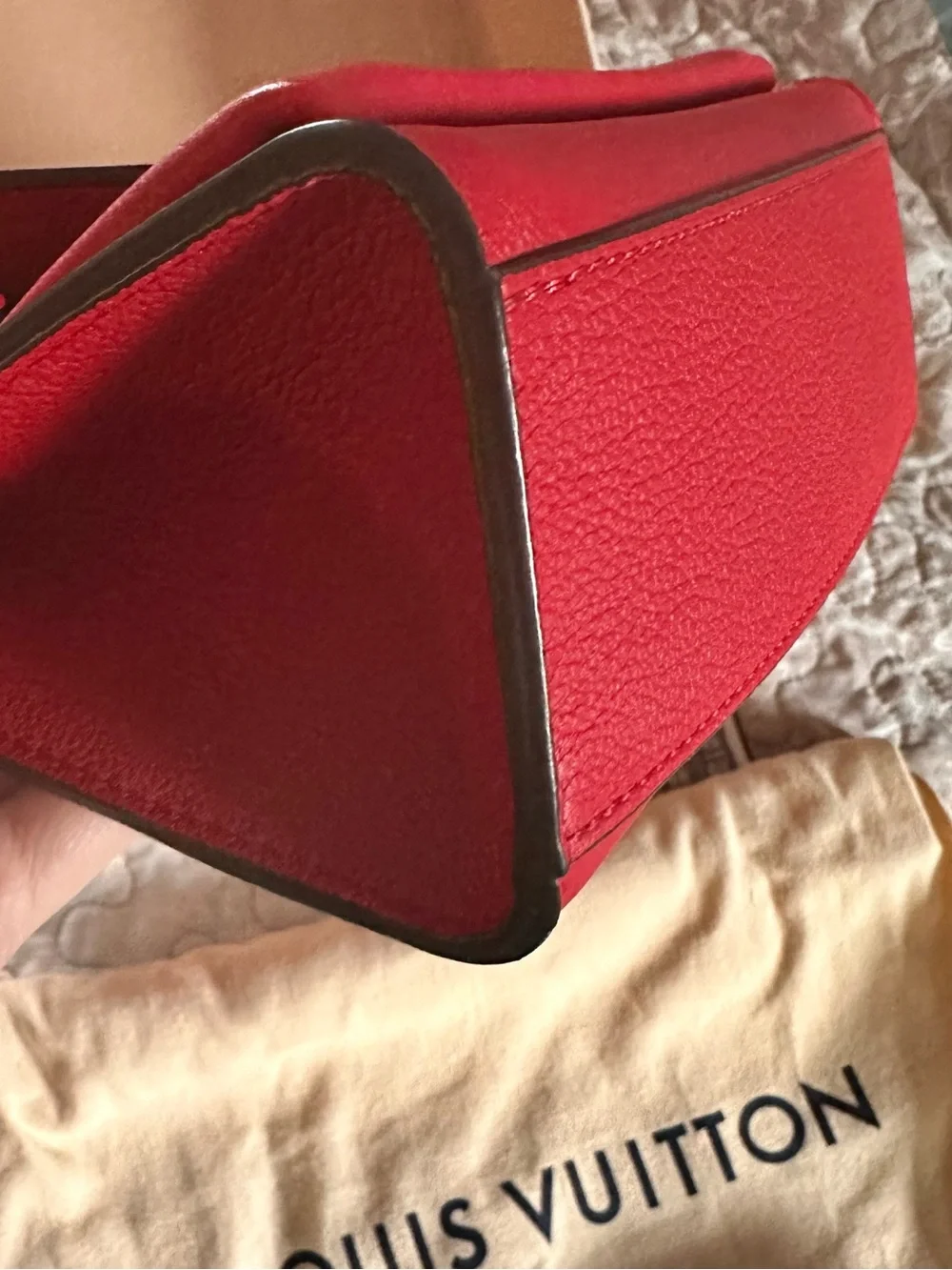 Louis Vuitton Mylockme BB in color RUBY